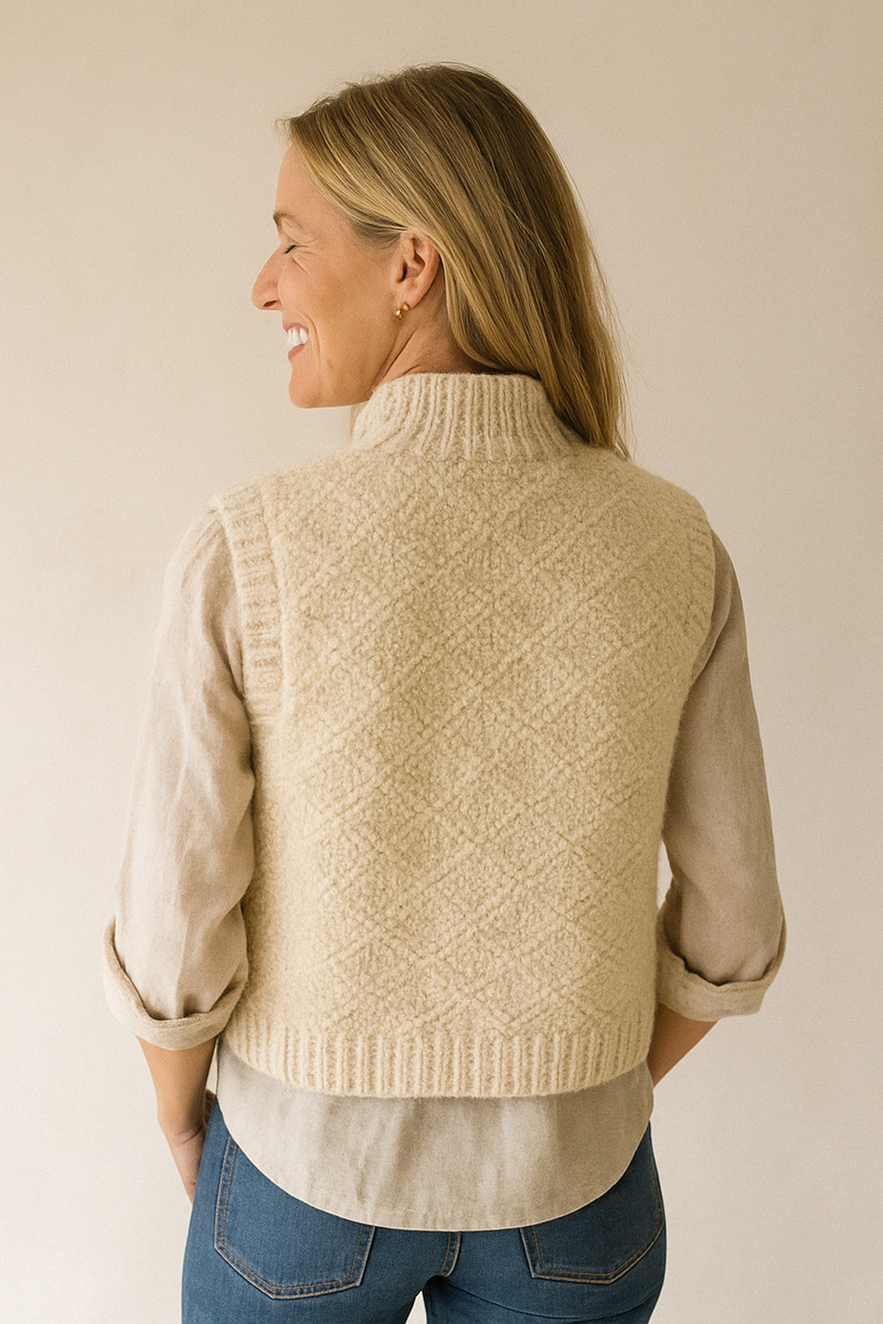 Ærmeløs sweater med høj hals