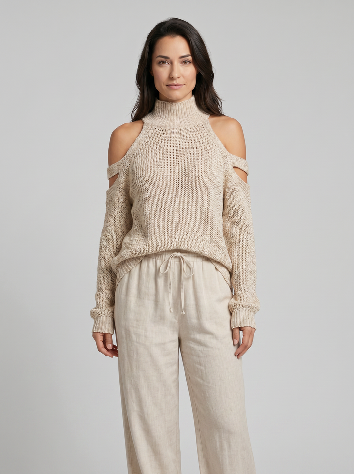 Conjunto de top de cuello tortuga en punto beige con hombros al descubierto y pantalones de pierna ancha